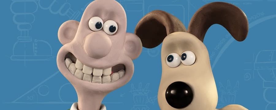 Wallace and Gromit raising their W and G mugs